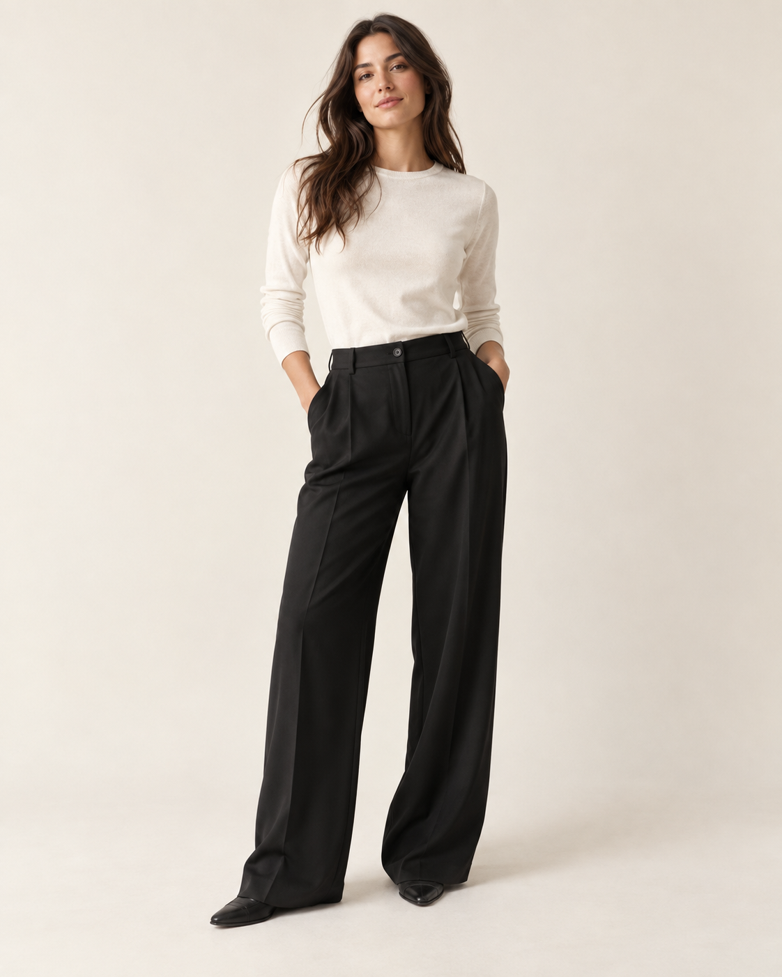 Woman wearing Maison Elin relaxed-fit trousers in black