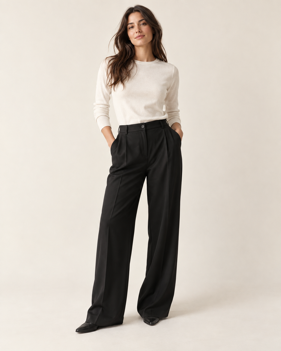Woman wearing Maison Elin relaxed-fit trousers in black